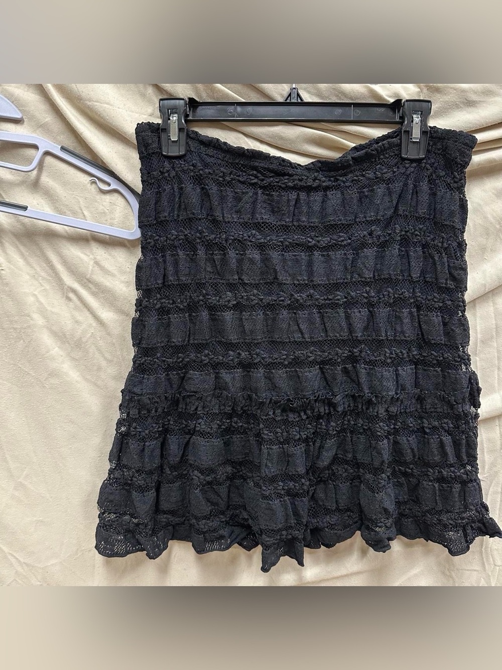 Guess branded Black frilly short midi skirt.